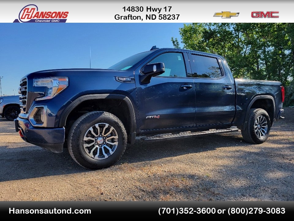 2019 GMC Sierra 1500 AT4 in Pacific Blue Metallic — front three-quarter view