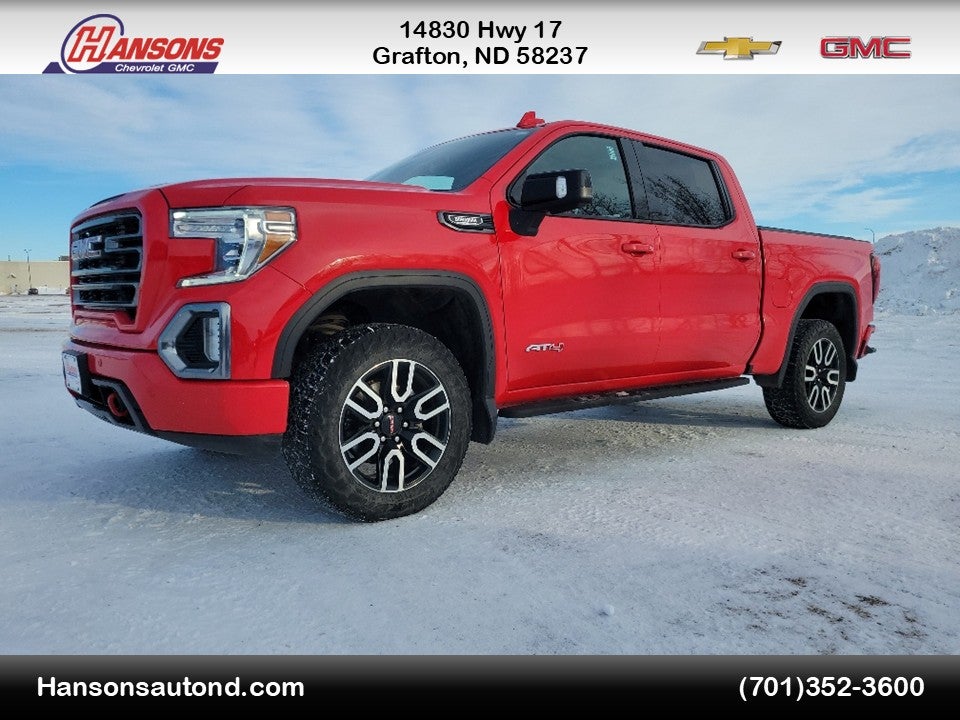 2021 GMC Sierra 1500 AT4 in Cardinal Red — front three-quarter view